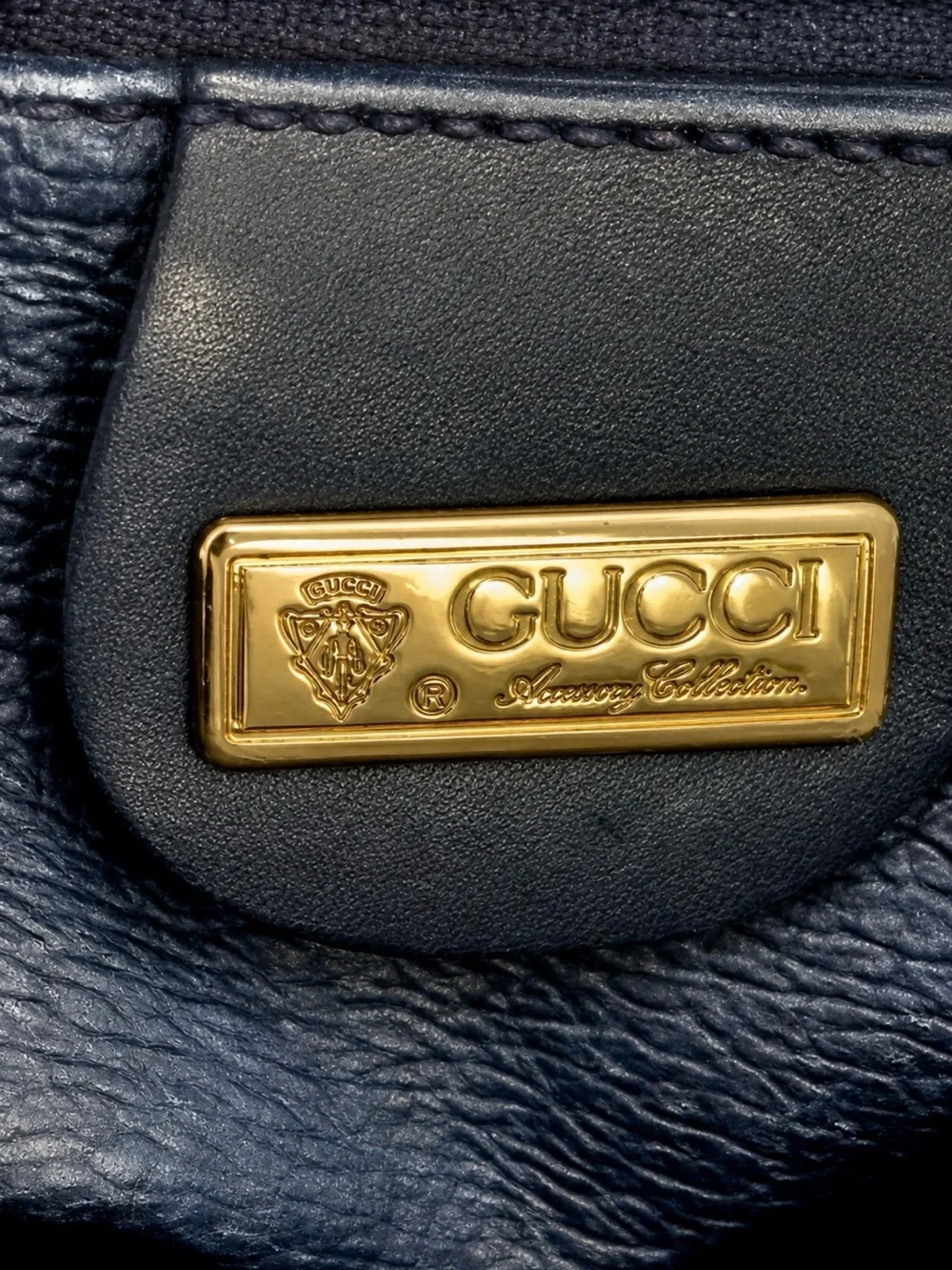 Authentic VintageGucci Gray Monogram Top-Handle Satchel with Navy Leather Trim.